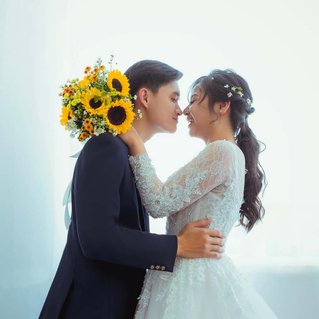 Bride and groom about to kiss, used for Coloring.app's AI photo-to-coloring page conversion tool.